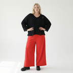 Rote Milano Stretch Hose mit weitem geradem Bein in Siebenachtellänge und Saumschlitz edel