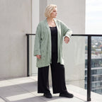 Pistaziengrüner Jerseycardigan in A-Linie mit Sternenmotiv aus Baumwolle und Elasthan