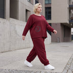 Oversized French Terry Hose in Schwarz mit Smileyprint gesmoktem Saum und weitem Bein
