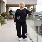 Oversized Hose aus flauschigem French Terry mit Smileydruck und bequem gesmoktem Saum