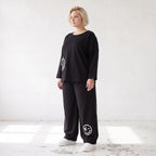 Oversized Hose aus flauschigem French Terry mit Smileydruck und bequem gesmoktem Saum