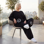Oversized Hose aus flauschigem French Terry mit Smileydruck und bequem gesmoktem Saum