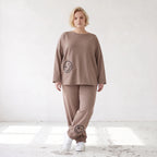 French-Terry Oversizedhose mit Smiley-Print gesmoktem Saum und Seitentaschen Streetstyle