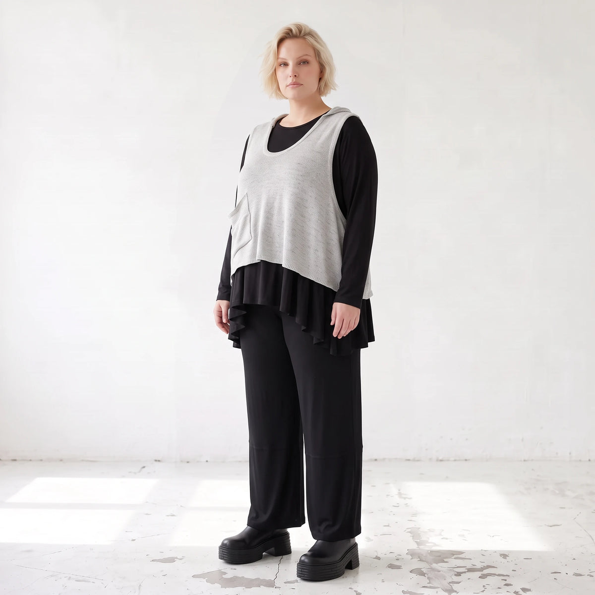 Ärmelloser Stricküberwurf in A-Linie mit Kapuze Tunnelzug Tasche und Baumwollstretch