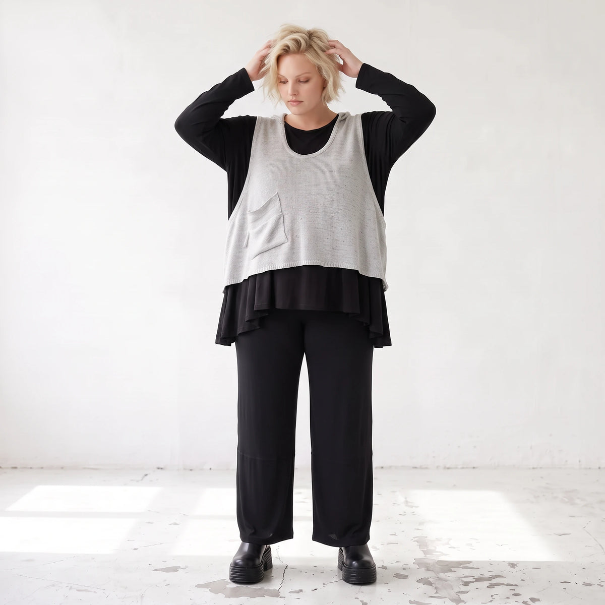 Ärmelloser Stricküberwurf in A-Linie mit Kapuze Tunnelzug Tasche und Baumwollstretch