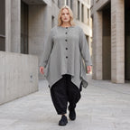 Bengalinebluse in Schwarz/Weiß A-Linie mit Rundhalsausschnitt Taschen und Zipfelsaum
