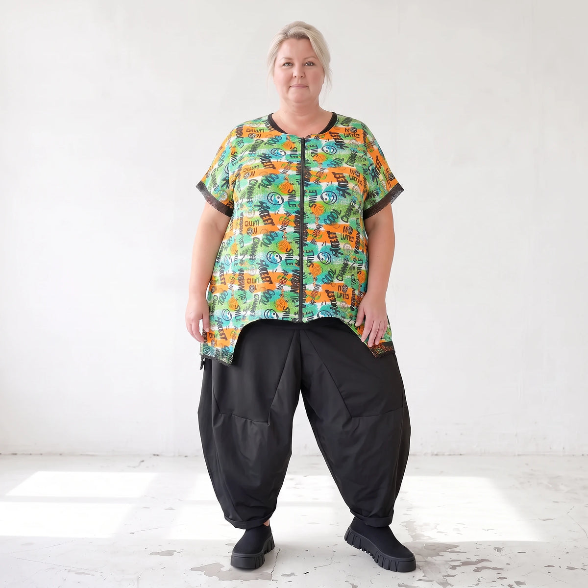Vokuhilaweste aus softem Stretchjersey mit Netzdetail und lockerem Schnitt modern chic