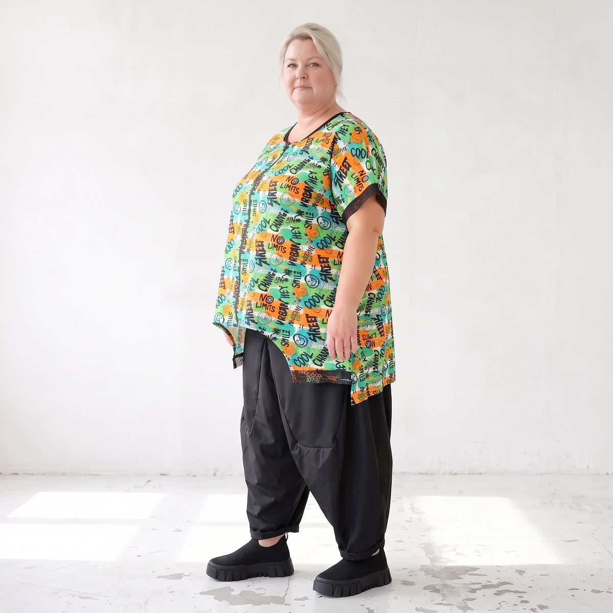 Vokuhilaweste aus softem Stretchjersey mit Netzdetail und lockerem Schnitt modern chic