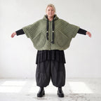 Teddyweste mit Kapuze und Tuelldetails in gerundeter Form weich warm fuer Wintertage