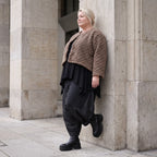 Teddyjacke aus flauschigem Stoff mit Rundhalsausschnitt Knopfleiste und gerundetem Saum