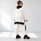 Rollkragenshirt aus fließendem Jersey mit Stretch Vokuhilaform mit seitlichen Schlitzen