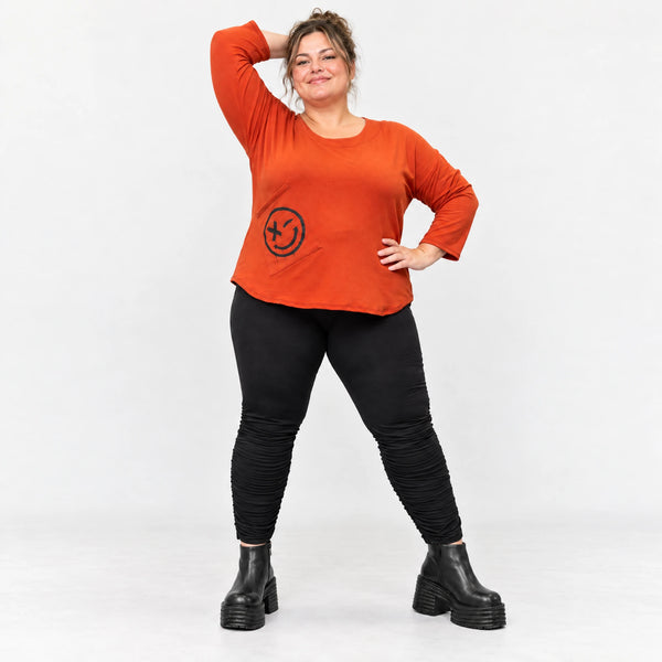 Shirt in Orange aus weichem Stretchjersey mit gerundetem Saum und aufgesetzten Taschen