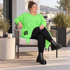 Langarmshirt in frischem Grün mit asymmetrischem Zipfelsaum aus weichem Stretchjersey