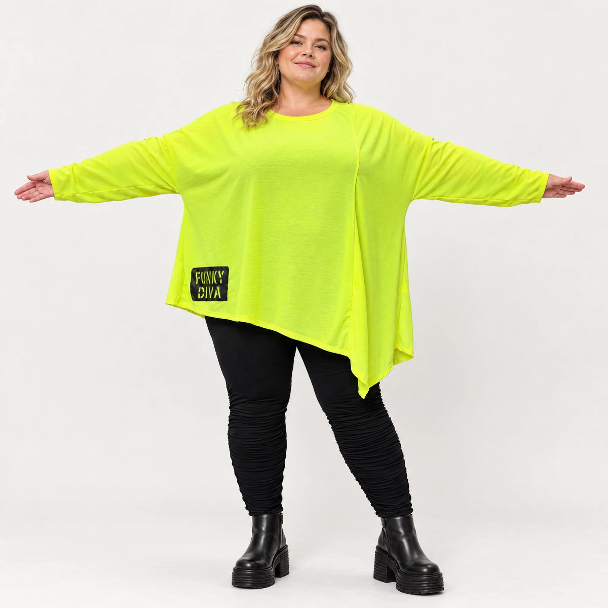 Langarmshirt in Neongelb mit asymmetrischem Zipfelsaum aus weichem Stretchjersey