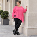 Langarmshirt in frischem Pink mit asymmetrischem Zipfelsaum aus weichem Stretchjersey