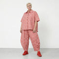 Luftige Ballon Hose im ausgefallenen Lagenlook mit weiten Beinen und tiefen Taschen, Mint/Pink