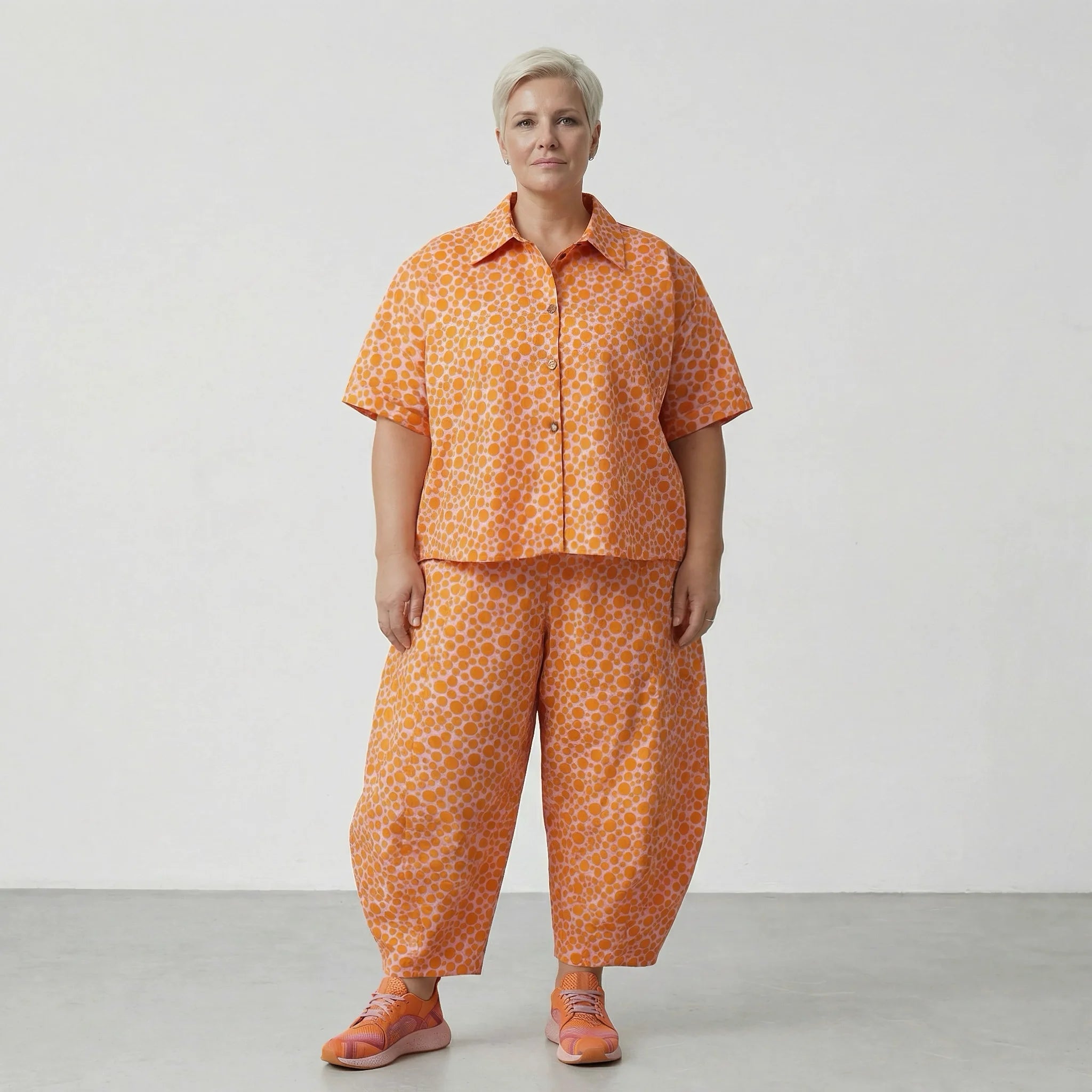 Leichte Ballonhose aus feiner Baumwolle im angesagten Lagenlook mit weiten Beinen und Punkten, Rosa/Orange