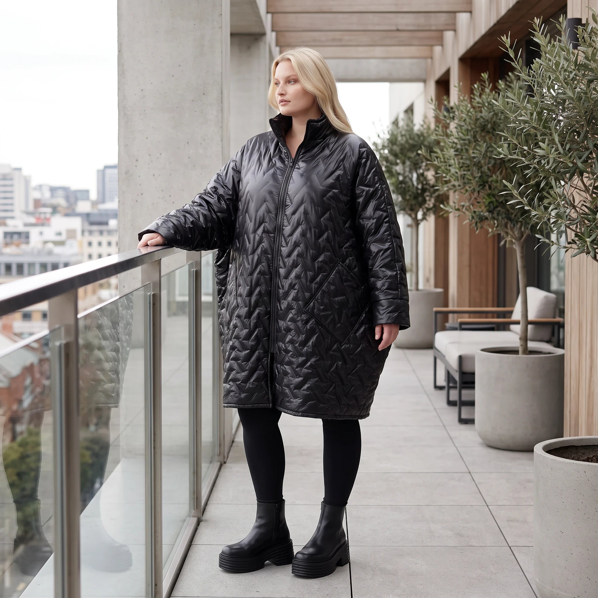 Schwarze Steppjacke mit grafischem Muster oversized wasserabweisend warm mit Taschen