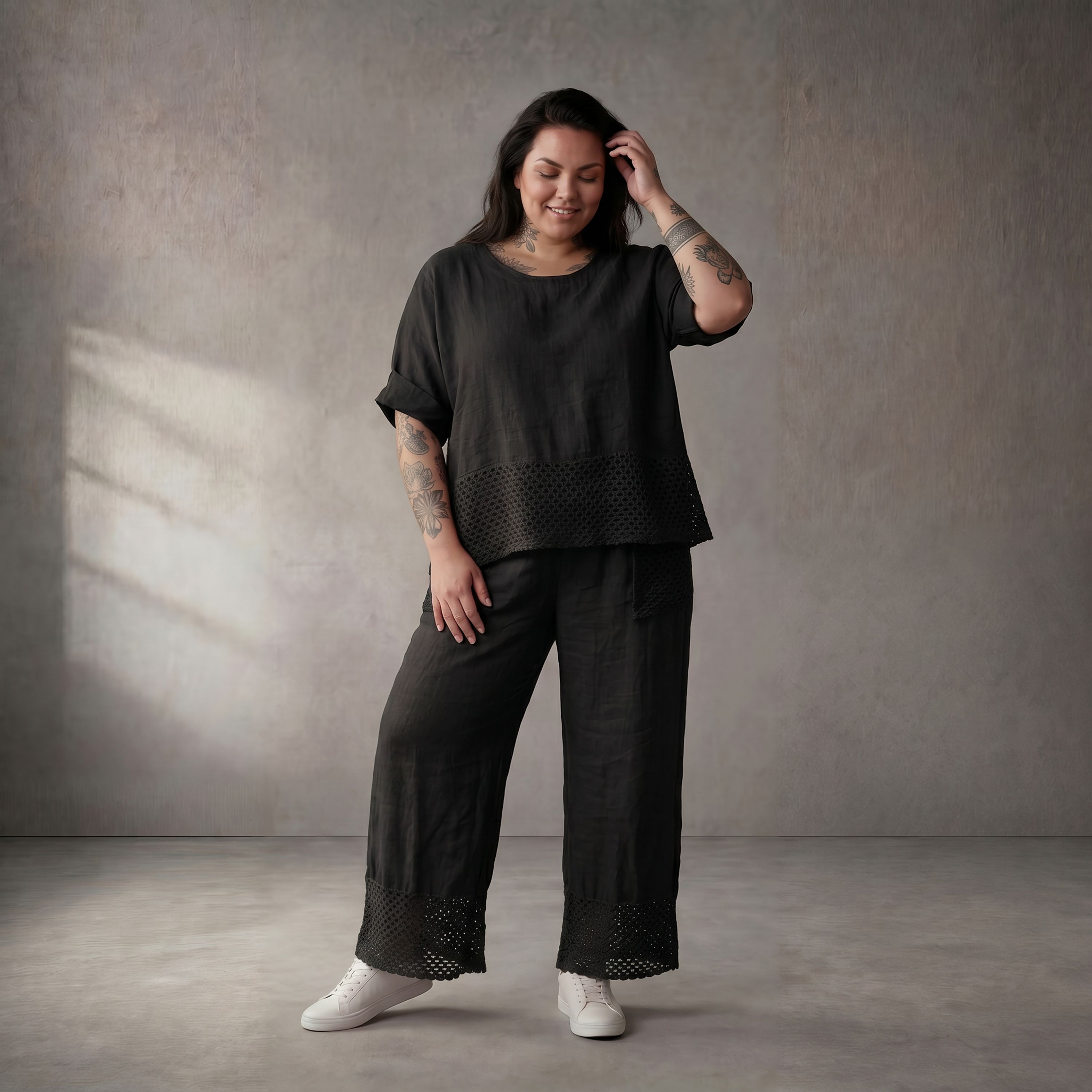 Zeitlose luftige schwarze Leinenhose im Lagenlook mit Strickdetails leger und ausgefallen