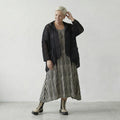 Zeitlos elegante Strickjacke im legeren Lagenlook mit feiner Lochstruktur und Memorytaft, Schwarz