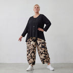 Fließende Ballonhose aus weichem Viskose Jersey in Schwarz und Ecru mit elastischem Bund