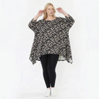 Ausgefallenes Oversize A-Form Shirt im angesagten Lagenlook mit pflegeleichtem Stretchmaterial, Schwarz/Weiß