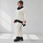 Rollkragenshirt aus fließendem Jersey mit Stretch Vokuhilaform mit seitlichen Schlitzen